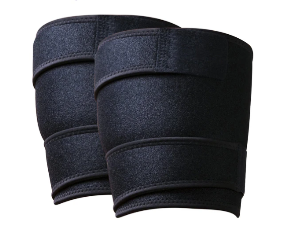 Two black knee pads on a white background