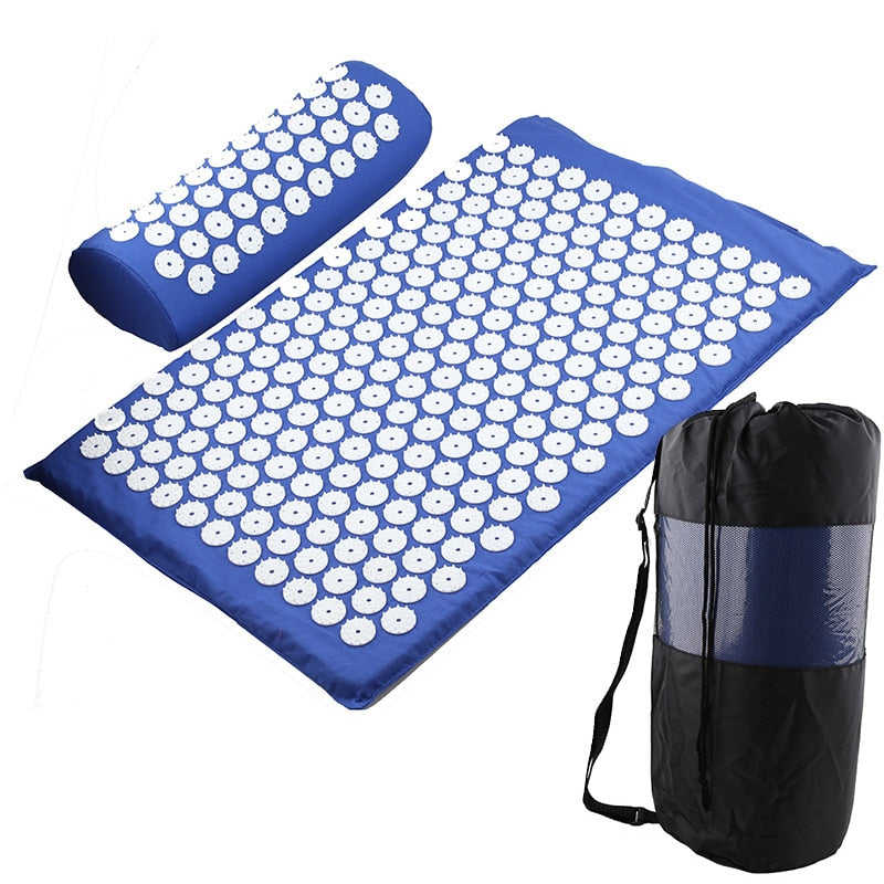 Acupressure mat and pillow set with carrying bag on a white background