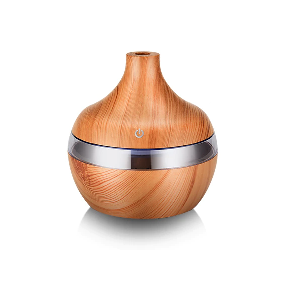 ECO Aroma Diffuser and Humidifier, hero front view in light wood-grain finish with 7-colour LED, designed to help balance dry indoor air.