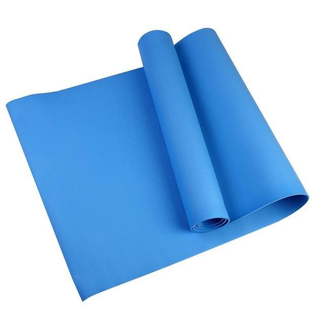 Blue mat rolled up on a white background
