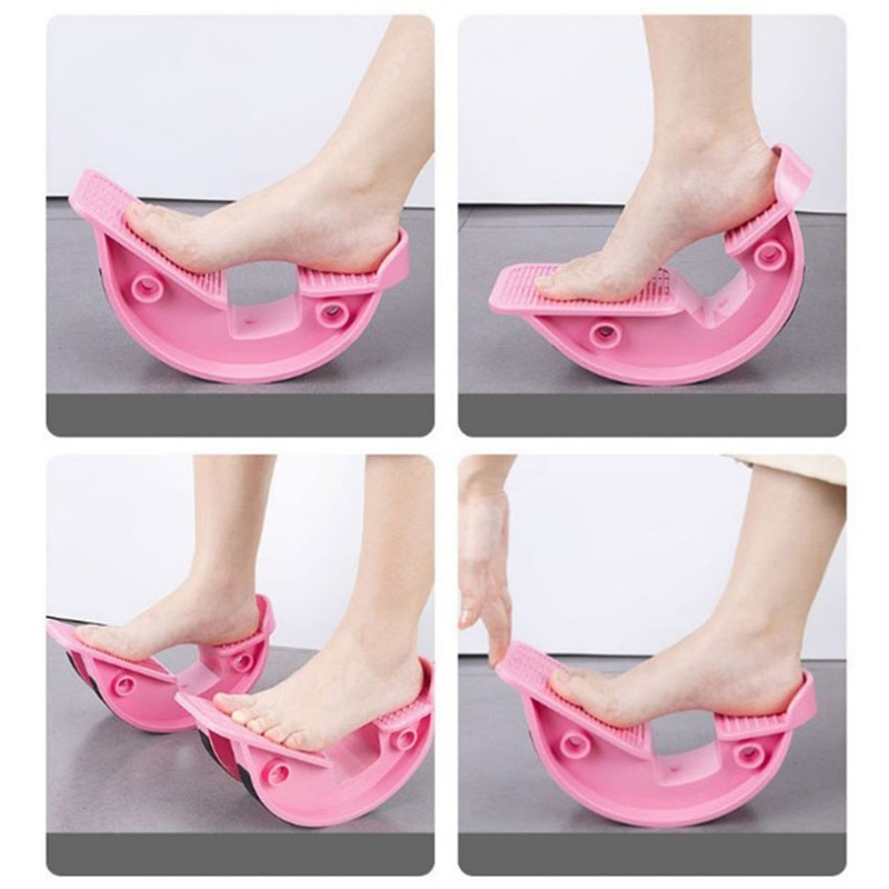 Pink foot stretcher device being used on feet against a white background