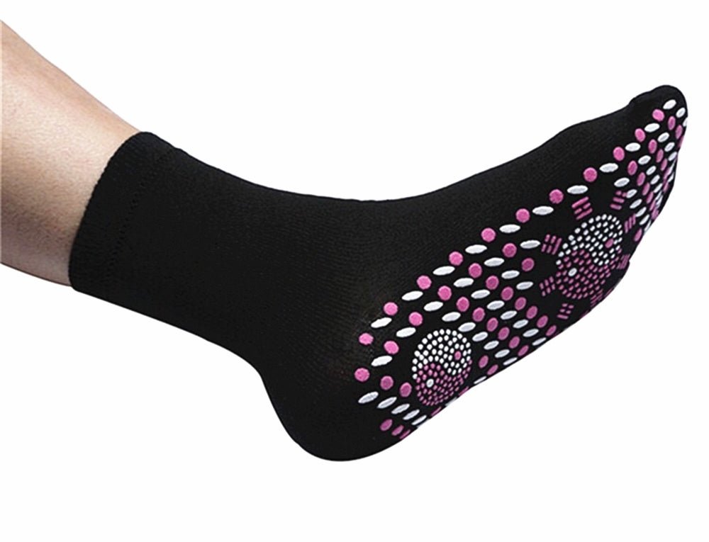 Black sock with pink and white pattern on a white background