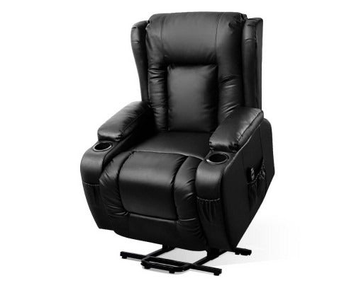 Black lift assist heated massage recliner chair in front view, showing ultra-wide padded seat, cup holders and remotes to support full-body comfort.