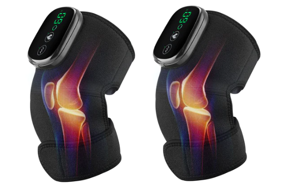 Pair of black knee support devices with digital displays on a white background