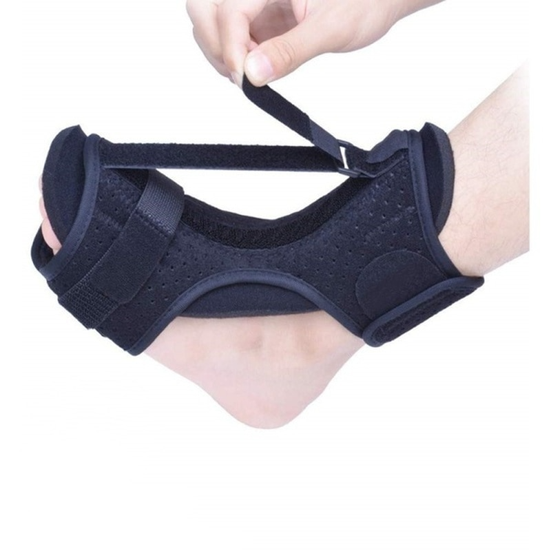 Orthopaedic foot and ankle splint front view showing adjustable straps and aluminium support plate for a gentle, customisable stretch.