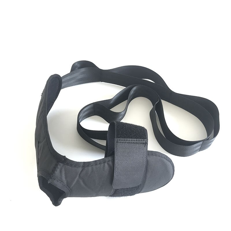 Black dog muzzle with straps on a white background