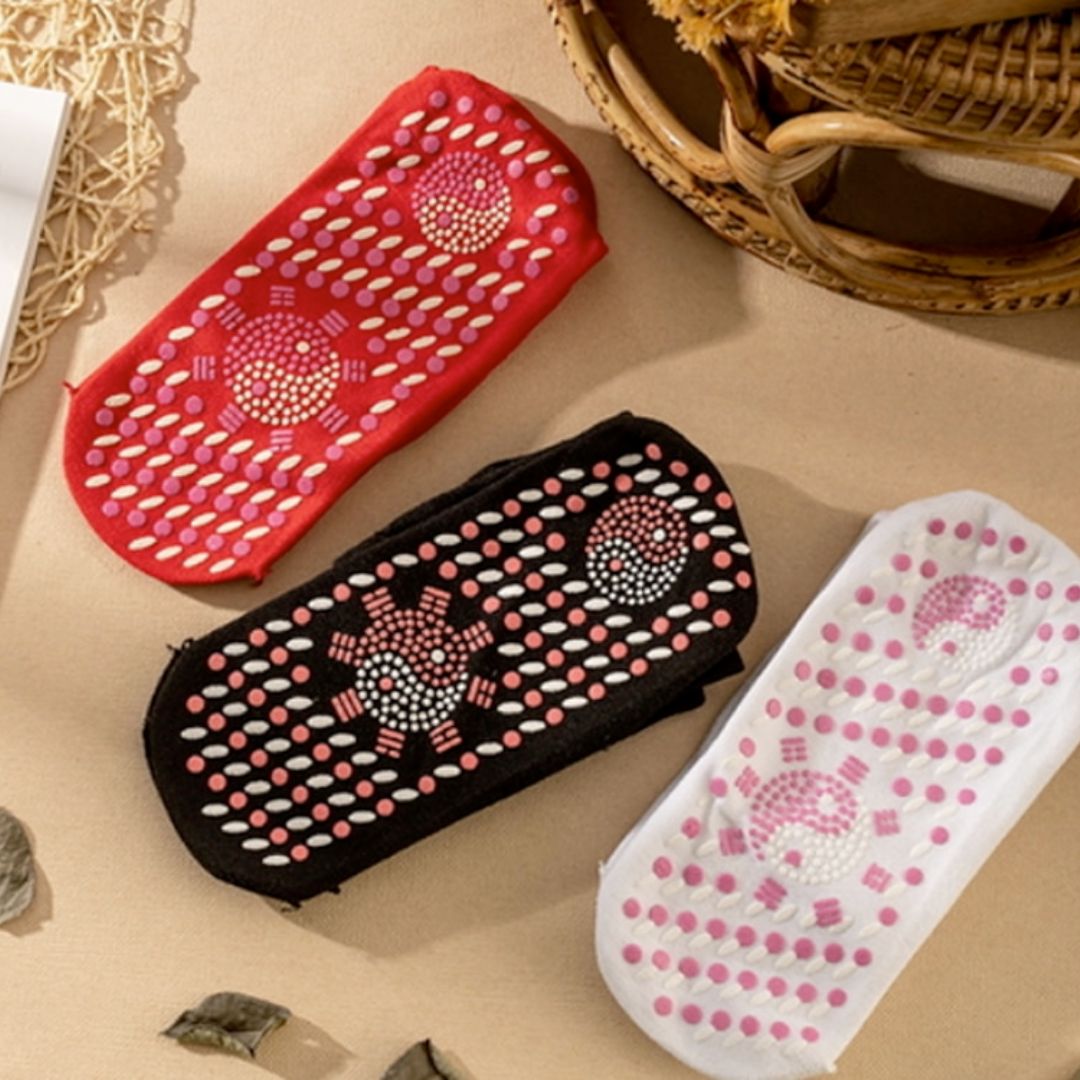 Relisora Self heating magnetic socks in black tourmaline fabric view, showing textured sole to help support warm, comfortable feet.