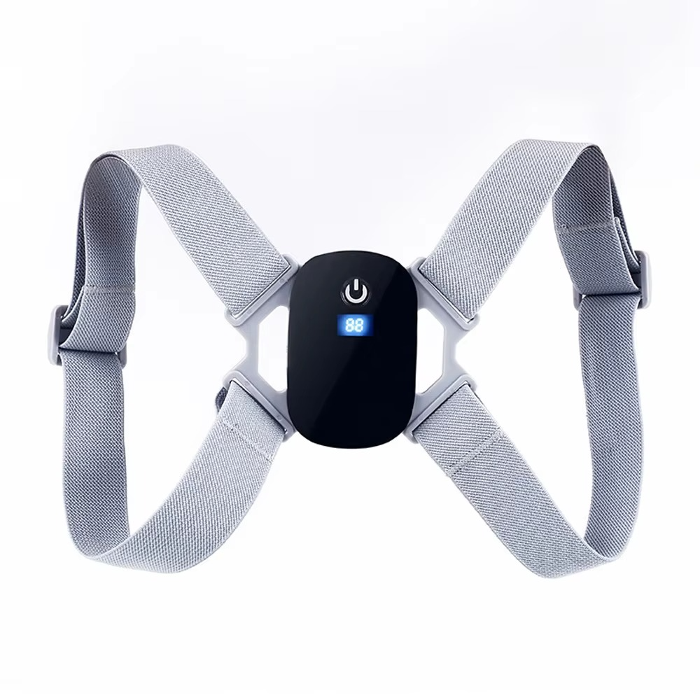 Gray harness with a black device featuring a power symbol on a white background