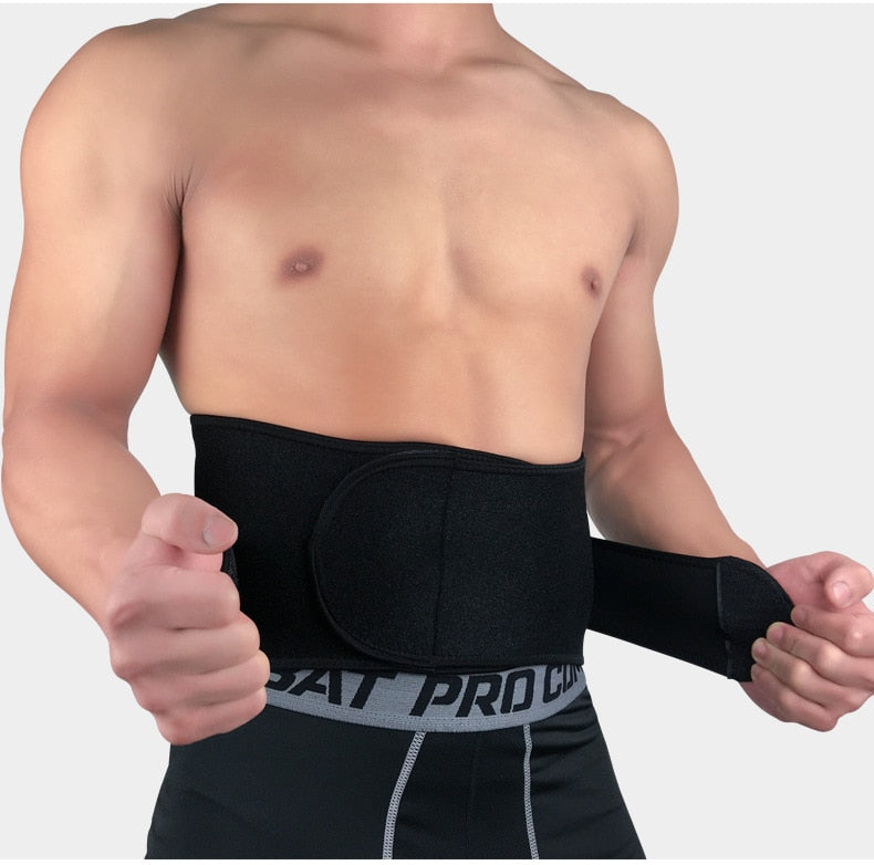 Person wearing a black waist support belt with visible branding on a plain background