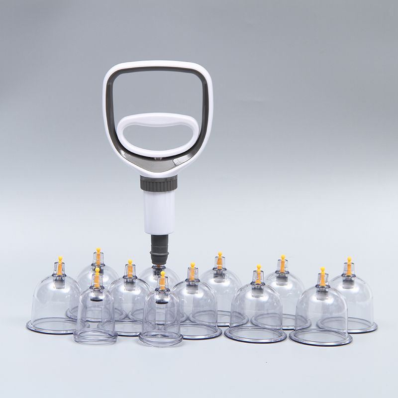 Professional cupping therapy set, hero view, showing assorted plastic cups with hand pump, extension hose, and carry case for adjustable, at-home muscle care.