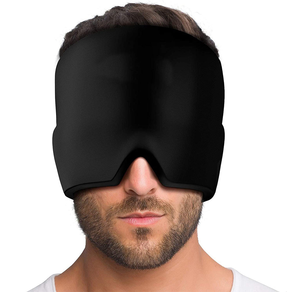 Person wearing a black sleep mask on a white background