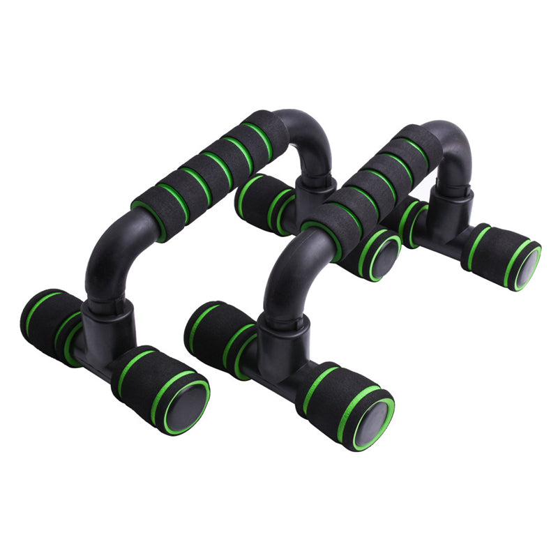 Black and green exercise push-up handles on a white background